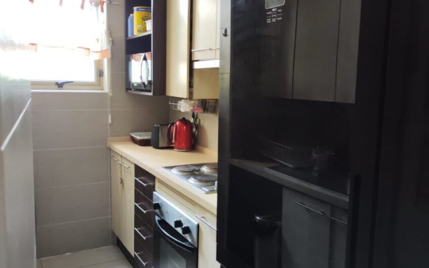 EXCELENTE DEPARTAMENTO DE 2 DORMITORIOS Y 2 BAÑOS CON ESTACIONAMIENTO Y BODEGA